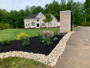 A well maintained lawn and flower bed. 